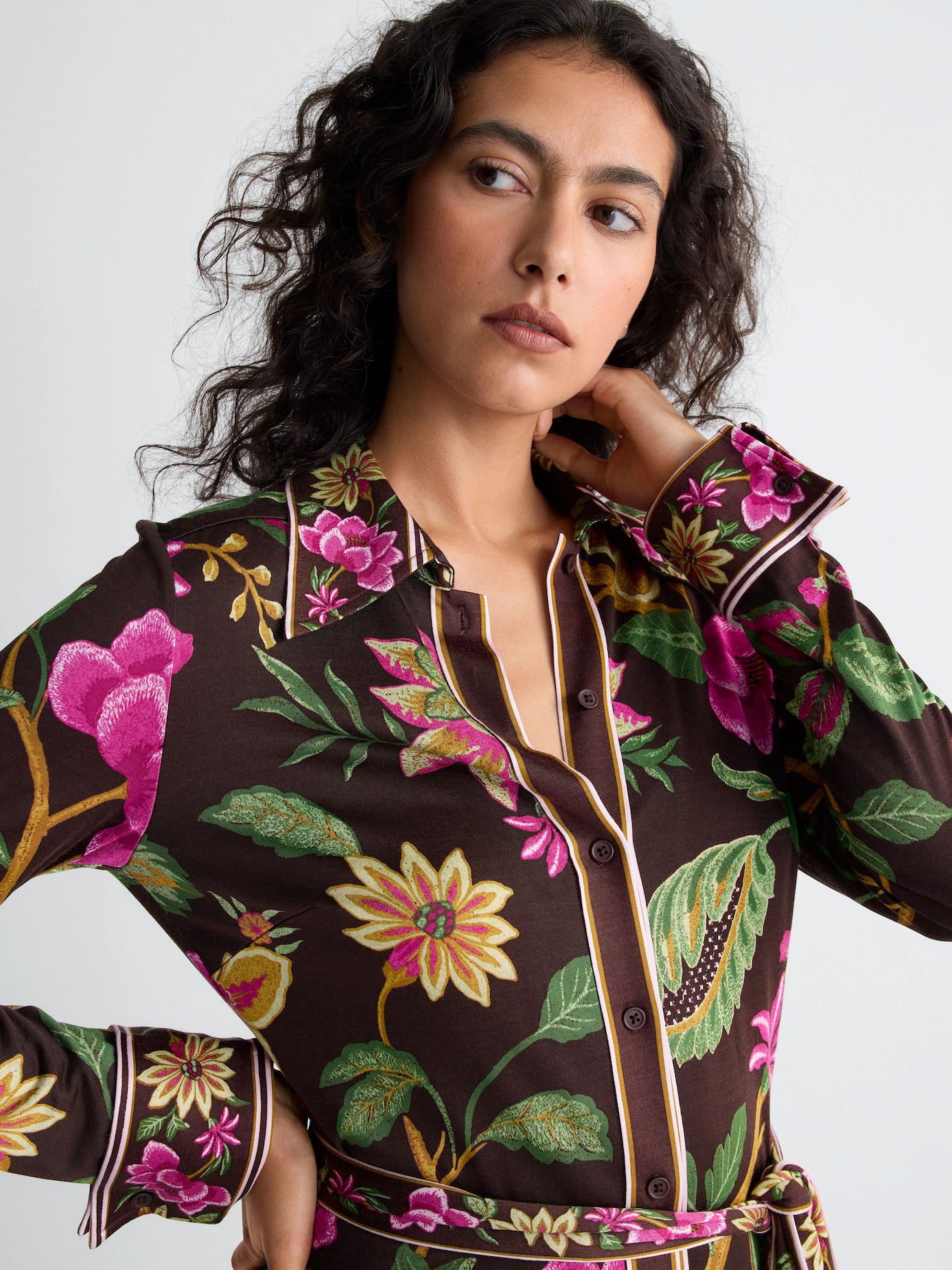 Model wearing a long-sleeve shirt dress.