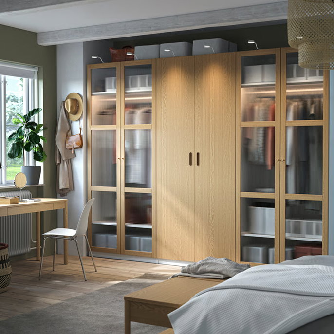 Wood-effect closets with glass doors.