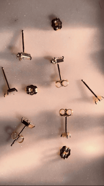 Overview of new pieces dropping this Friday shown in a video with shadows moving across the earrings.
