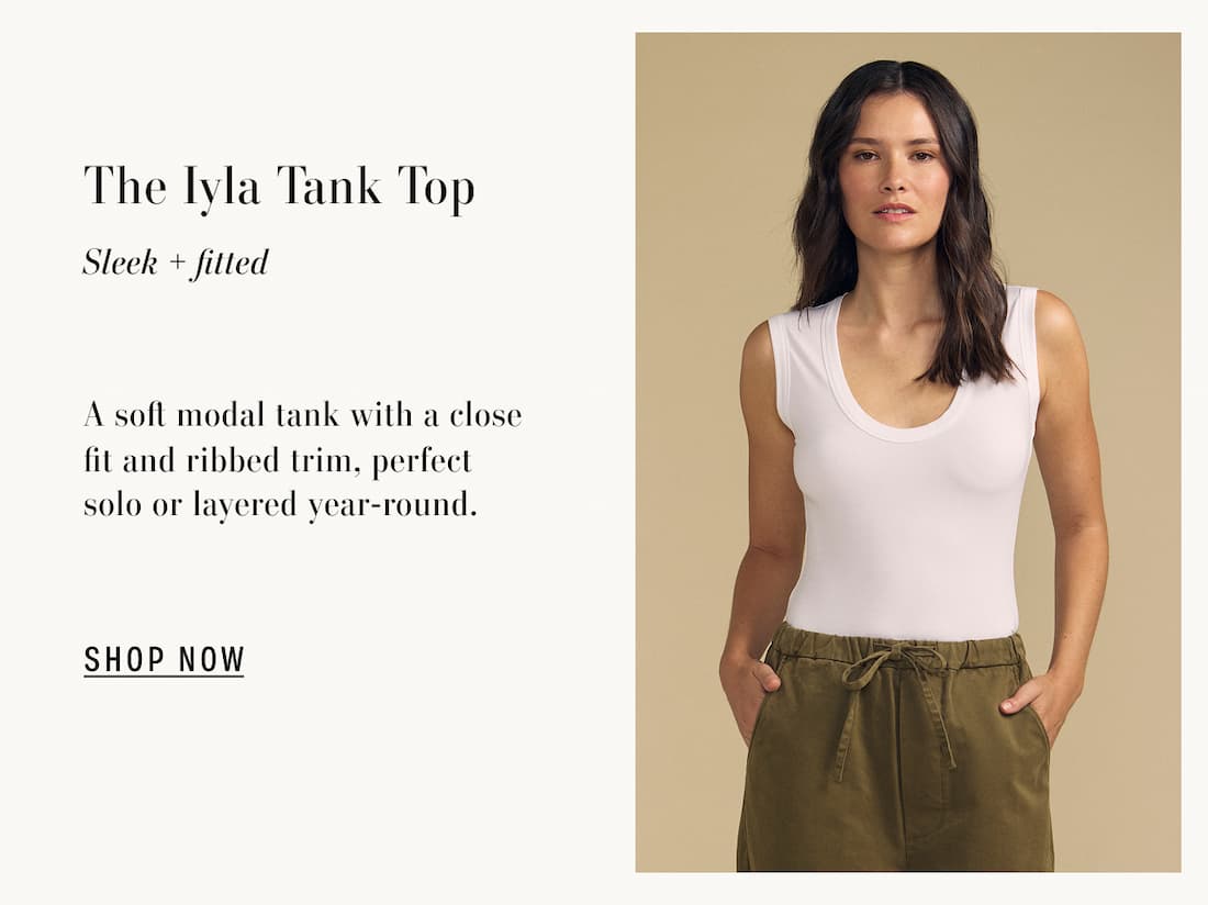 Image of model wearing Iyla in White. Text reads: The Iyla Tank Top. Sleek + fitted. A soft modal tank with a close fit and ribbed trim, perfect solo or layered year-round.