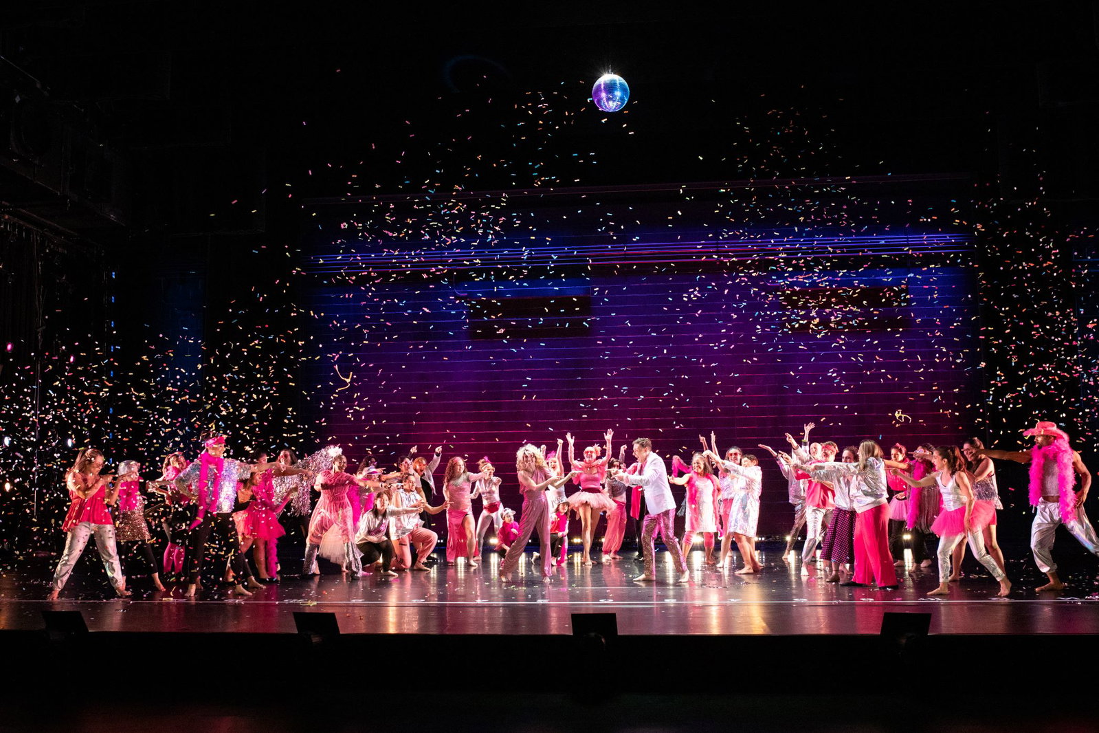 Members of The Missing Element dance onstage