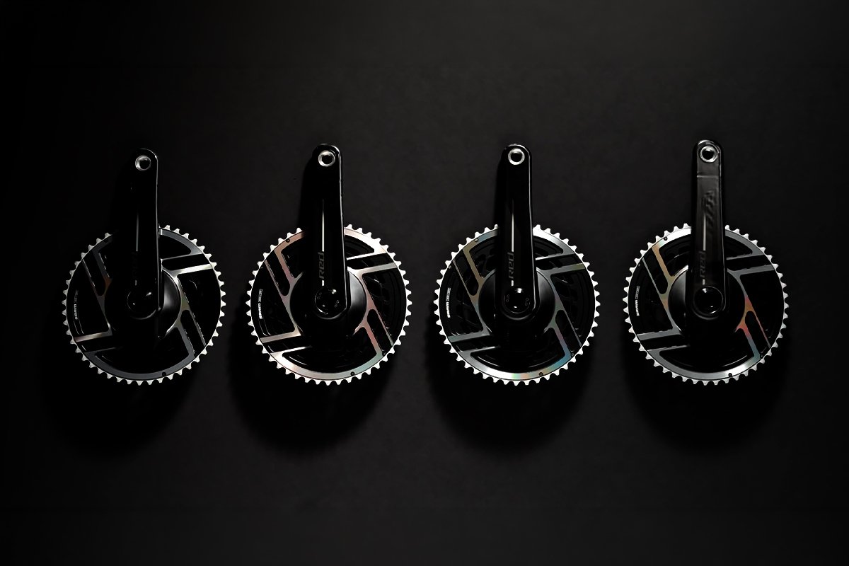 Four Domane cranksets in a row on a black background, showcasing crank length options