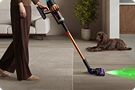 A Dyson cordless vacuum is used to clean around the home.