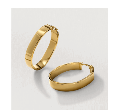 Yellow gold oval hoop earrings.
