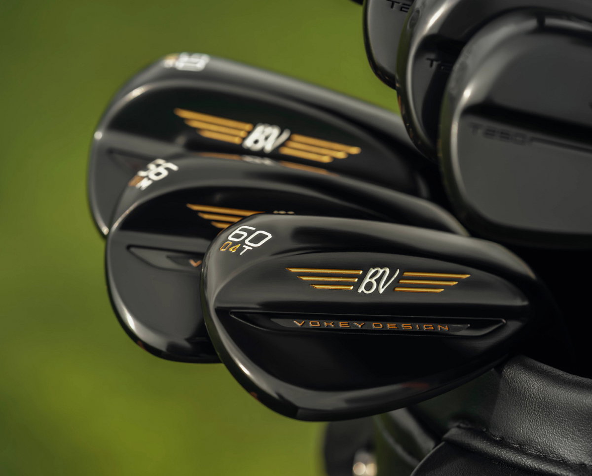 Image of a set of Black Vapor wedges in a golf bag