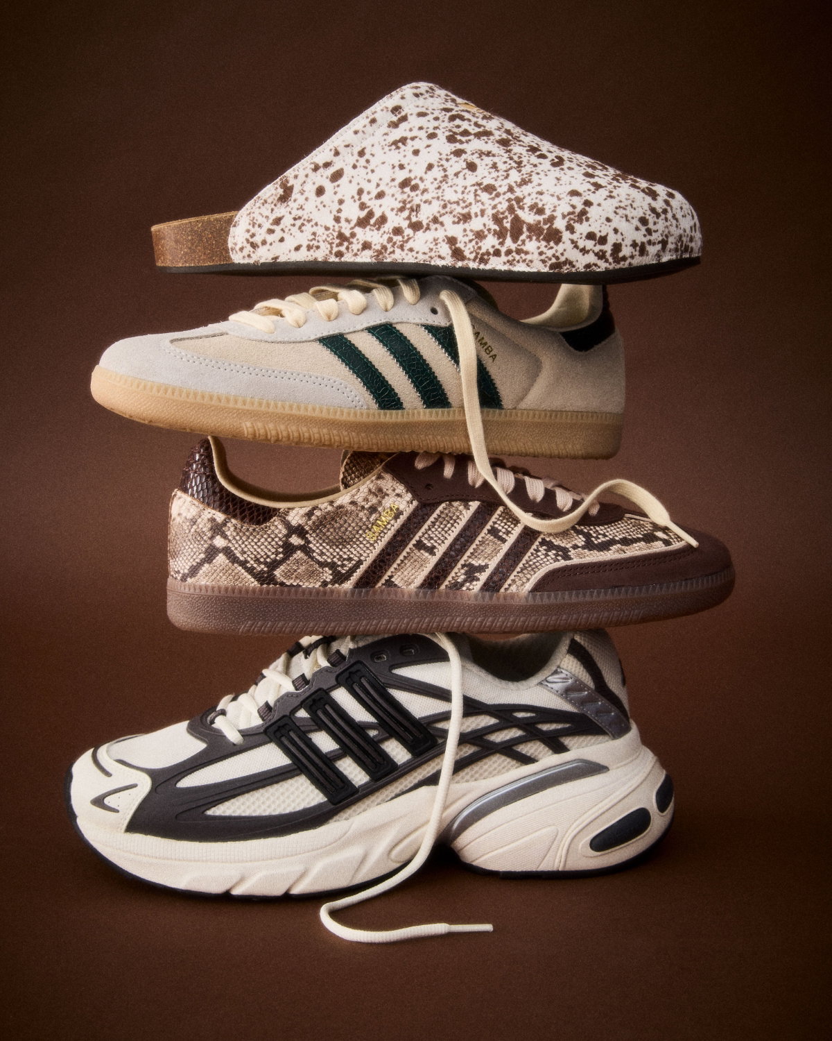 Stack of adidas shoes and sneakers