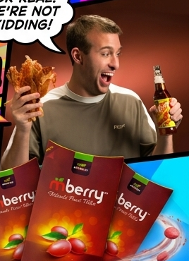 Man tasting bacon beside mBerry miracle fruit tablet packages