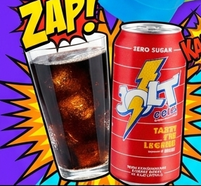 Jolt Cola energy drink can beside a glass of cola