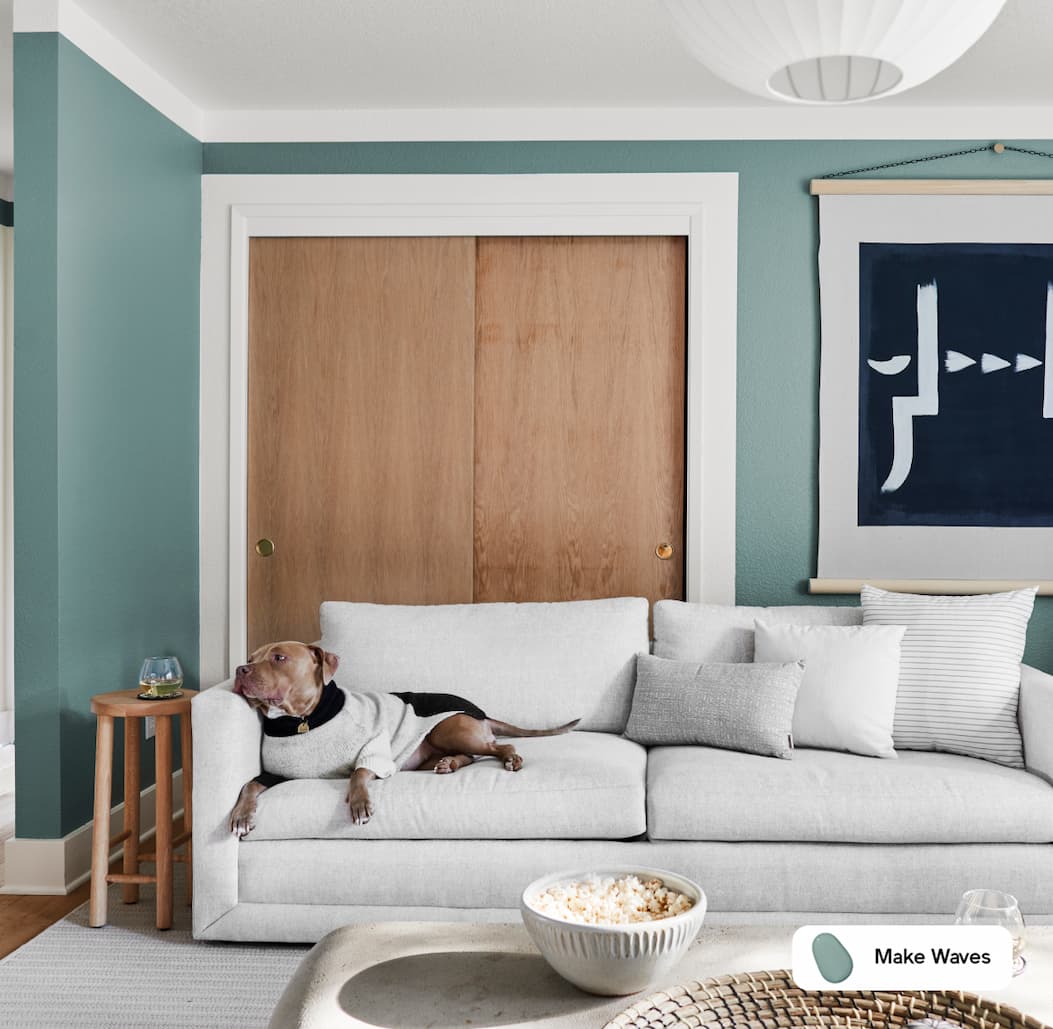 Living room featuring blue green paint color Make Waves