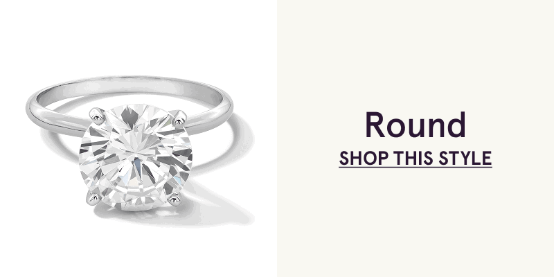 White-metal band with round centered diamond. Round. Click here to shop this style