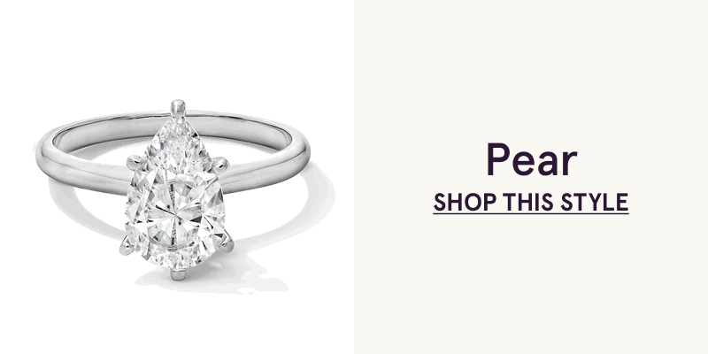 White-metal band with pear-shape centered diamond. Pear. Click here to shop this style