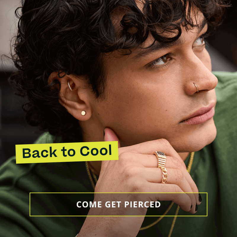 Focus on male model’s gold rings & studs. Back to cool. Click here to come get pierced 