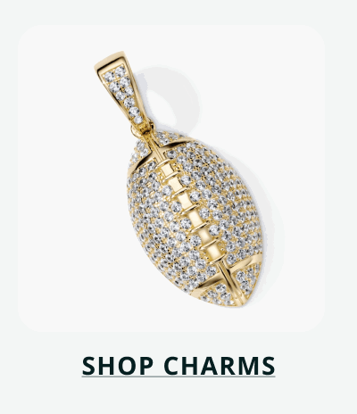 Gold-set football charm with engraved diamonds. Click here to shop charms