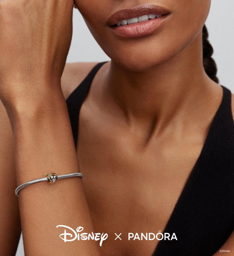 Image showing a model dressed as Princess Jasmine. She wears Jasmine rings, a necklace and bracelet with tiger charms and a sparkling tennis bracelet. 