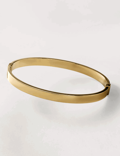 Yellow gold sleek bangle bracelet.