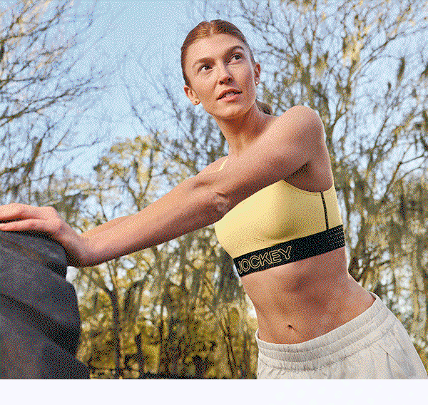 image of yelllow ventracool sports bra on model
