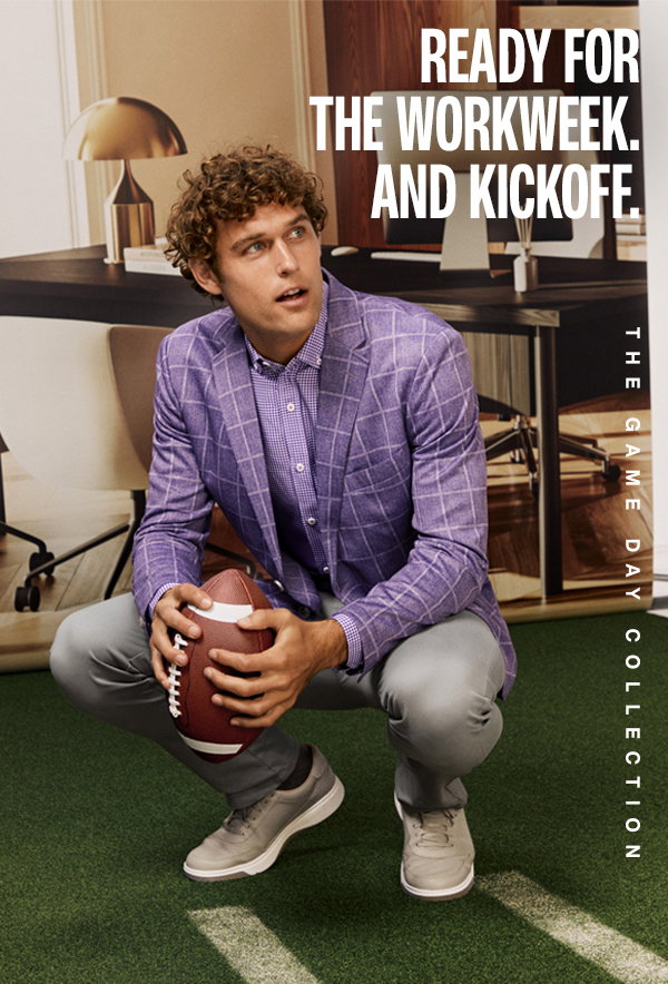Model wearing a purple windowpane blazer, patterned shirt, gray pants, and casual sneakers while holding a football in an office setting. Text reads: 