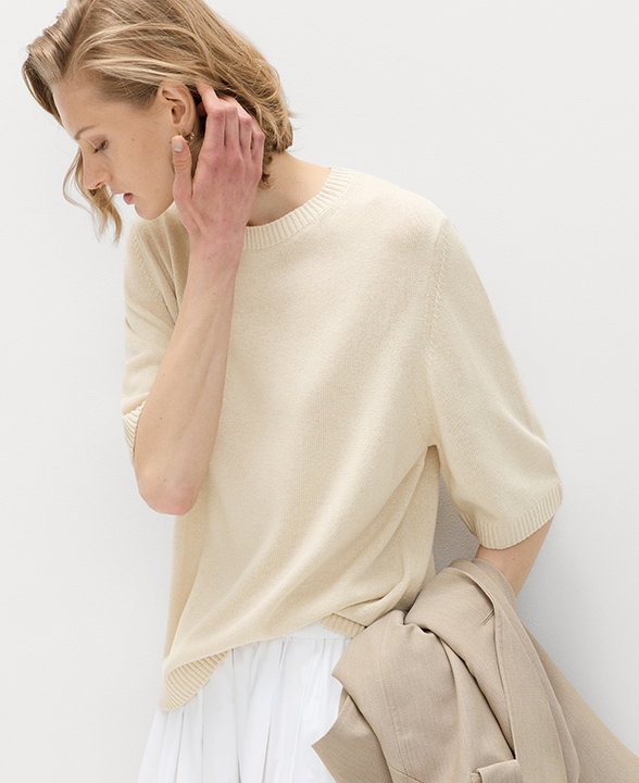 Woman wearing a Beige Relaxed Fit Knitted Top With Linen