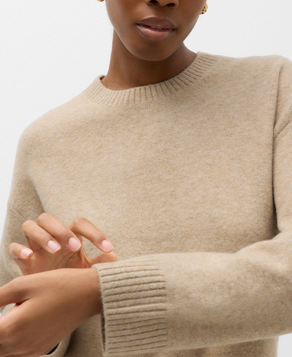 Woman wearing a Medium Beige Crew Neck Jumper with Wool