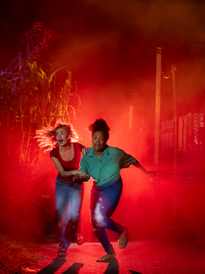 A group of friends inside a haunted house at Busch Gardens