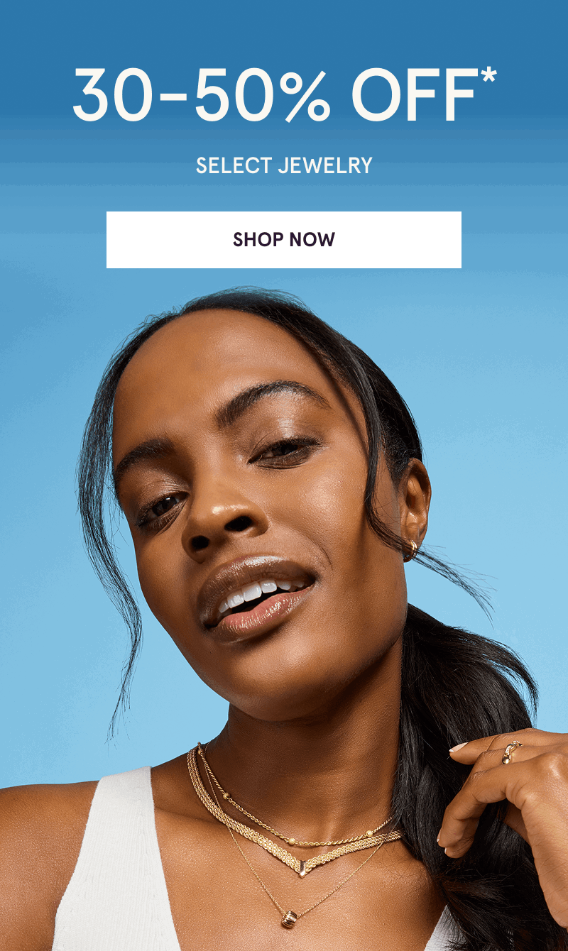 Model layered in assortment of gold necklaces. 30-50% OFF Select Jewelry. Click here to shop now