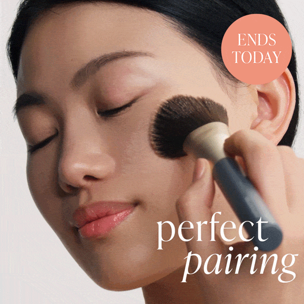model applying Glow Fixation with a brush 