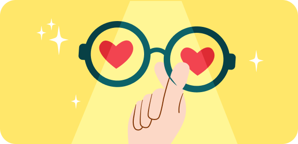 Illustration of a hand holding frames with heart emojis on the lenses