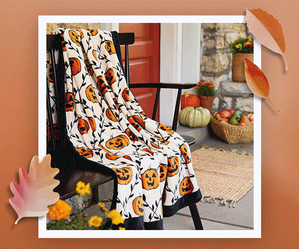 Rotating image of fall gifts and decor includes blanket, wreath, serving board, puzzle and more.