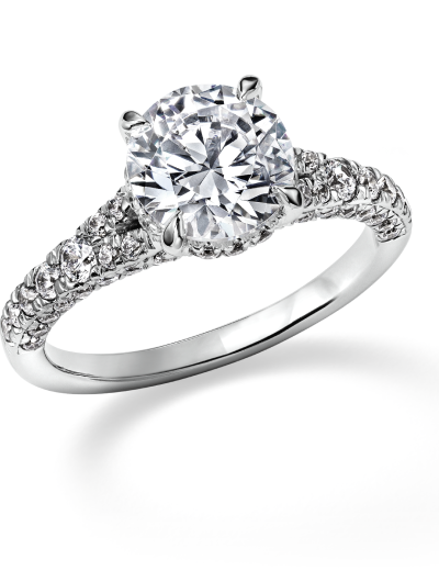 White gold engagement ring with a round-cut diamond and diamond pavé band.