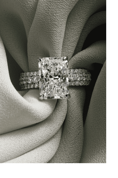 Princess-cut diamond engagement ring with matching diamond wedding band.
