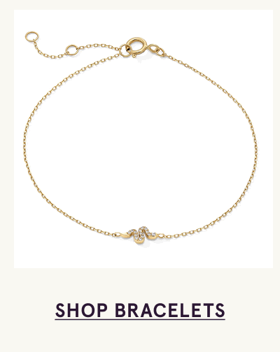 Fine gold chain bracelet with pavé diamond snake motif. Click here to shop bracelets