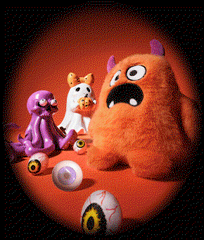 A trio of cute Halloween figures alongside some eyeball-style balls. 
