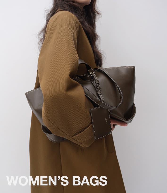 A.P.C. woman holding Fall bag