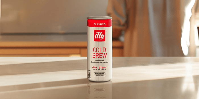 Illy Classico cold brew can displayed on a sunlit countertop