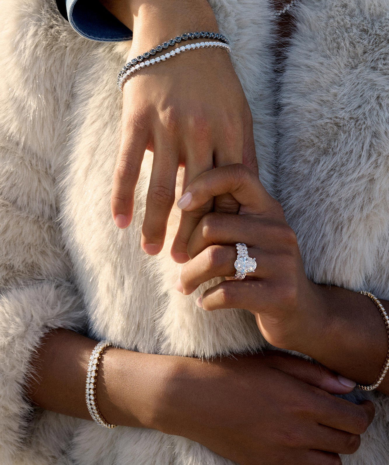 Image of a woman with jewelry prominently worn