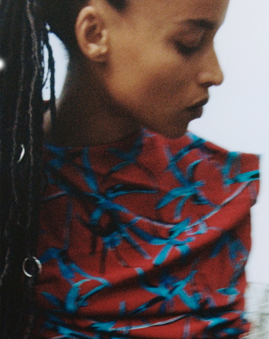 Cropped image of model wearing the Bodine Dress in Printed Stretch Cady in Madder