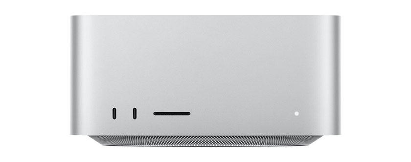 Mac Studio, front, two USB-C ports, SDXC card slot, status indicator light, tapered base at bottom, flat top, rounded sides, straight edges, silver color