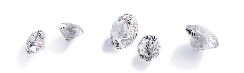Assortment of loose diamonds in round shapes.
