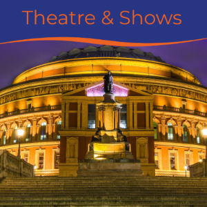 Illuminated theatre building with a statue in front, featuring a night sky backdrop.
