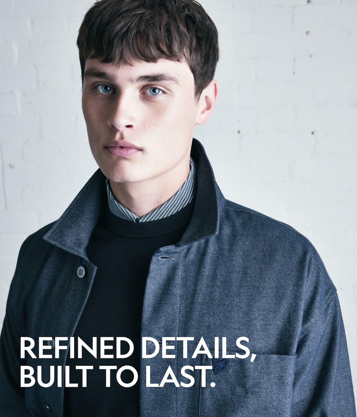 Model wears lightweight overcoat