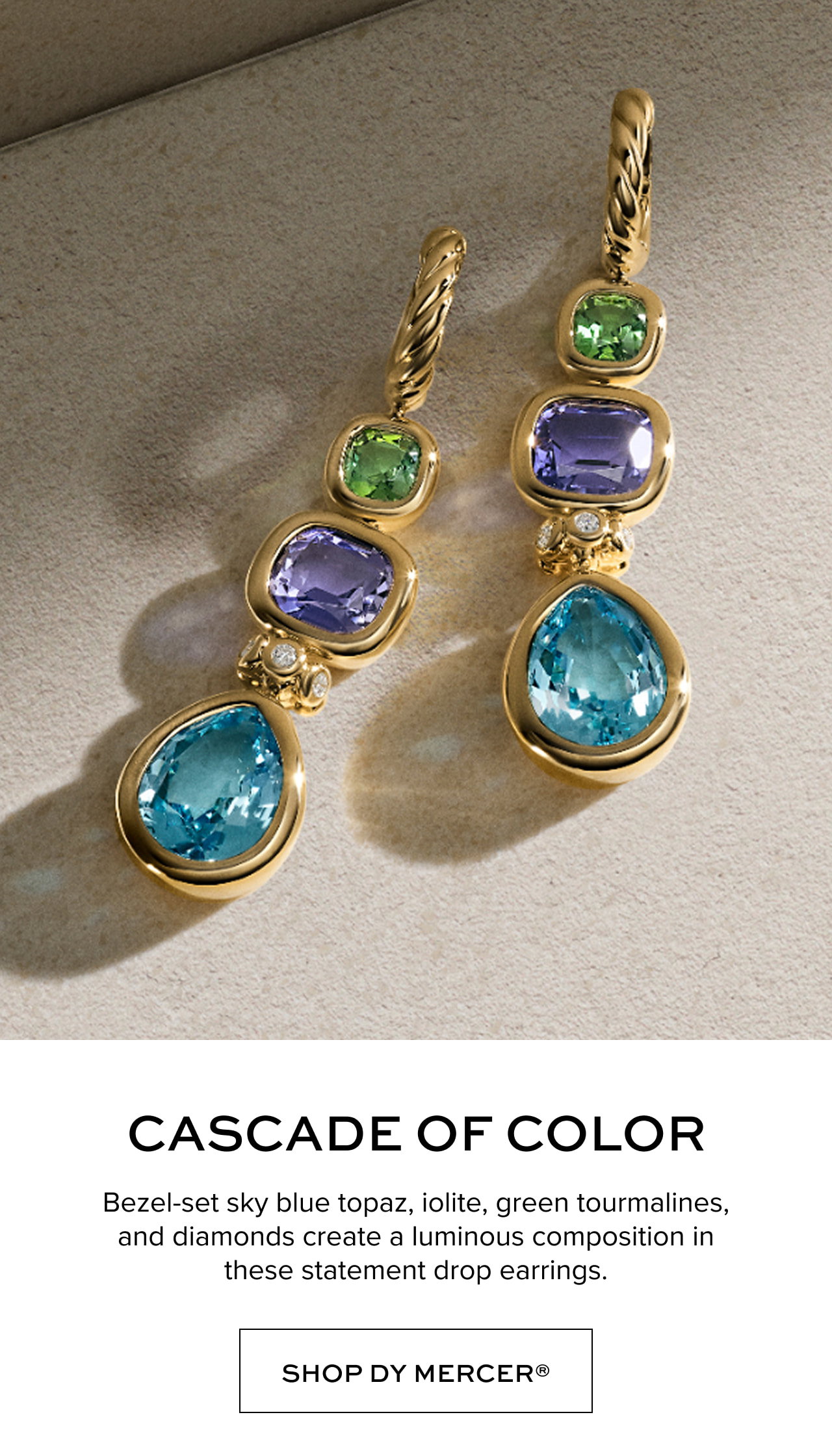 Cascade of Color: Bezel-set sky blue topaz, iolite, green tourmalines, and diamonds create a luminous composition in these statement drop earrings. Shop DY Mercer.
