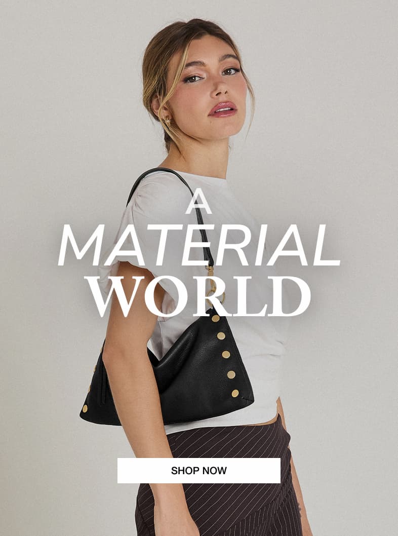 Close-up of Hammitt handbags showcasing a variety of rich leather and suede textures with signature hardware. SHOP NOW