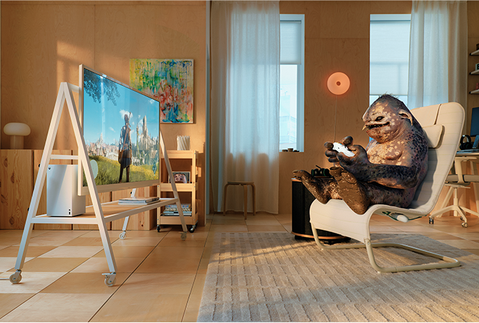 An animated gaming character sits in an YXSTABY gaming lounge chair in a bright living room playing a game on the TV.