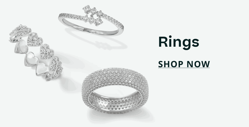 Silver heart-shaped pave band, constellation bypass & wide pave dome band. Rings. Click here to shop now