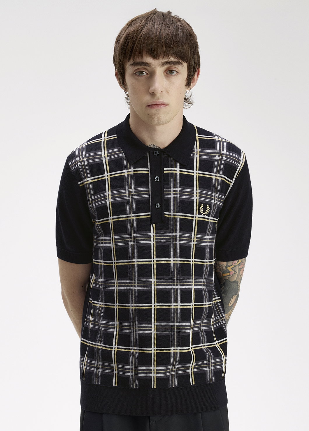 Introducing the Only At Fred Perry collection: male model wears a Fred Perry Tartan Knitted Shirt in Black 