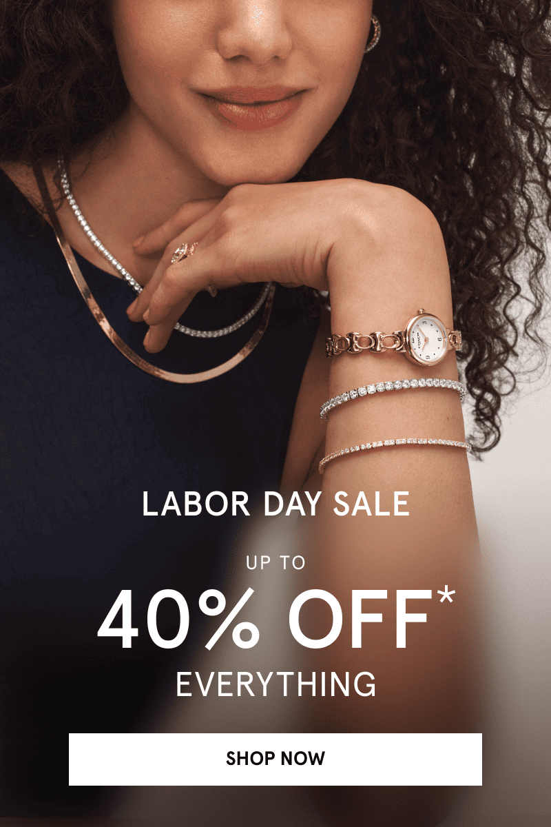 Woman wearing layered necklaces, gold watch and diamond bracelets. Labor Day sale. Up to 40% OFF everything. Click shop now.