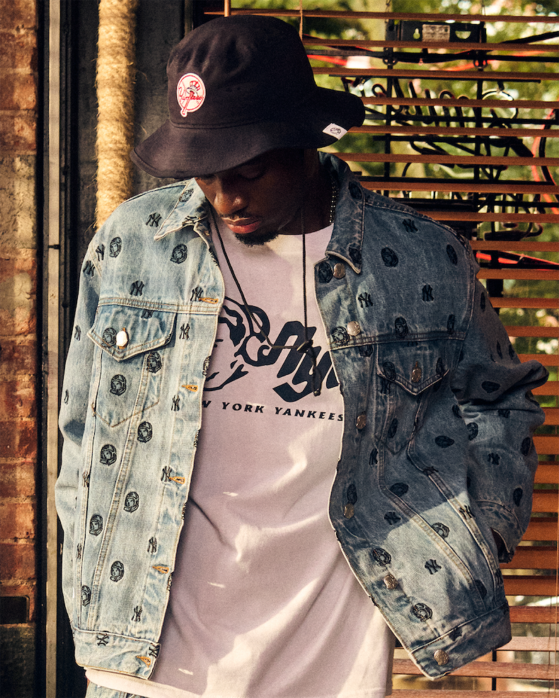 Model wearing New York Yankees™ | Billionaire Boys Club Bucket Hat, Denim Trucker Jacket and T-shirt
