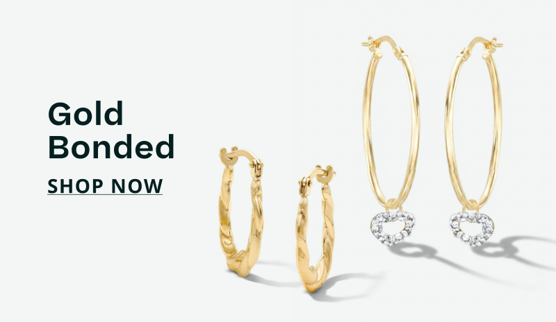 Gold-colored twisted hoops & heart diamond charm hoops. Gold Bonded. Click here to shop now