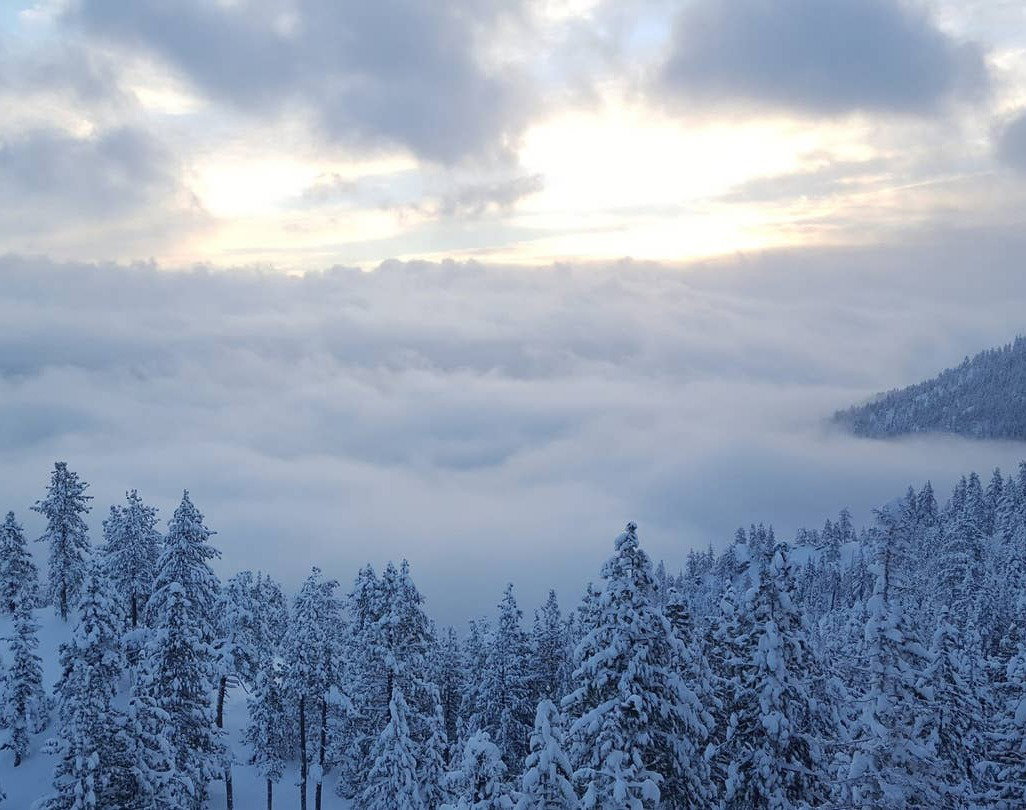 Mountains with clouds over valley