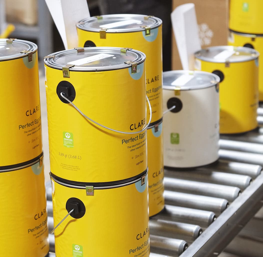 Clare paint cans in the warehouse